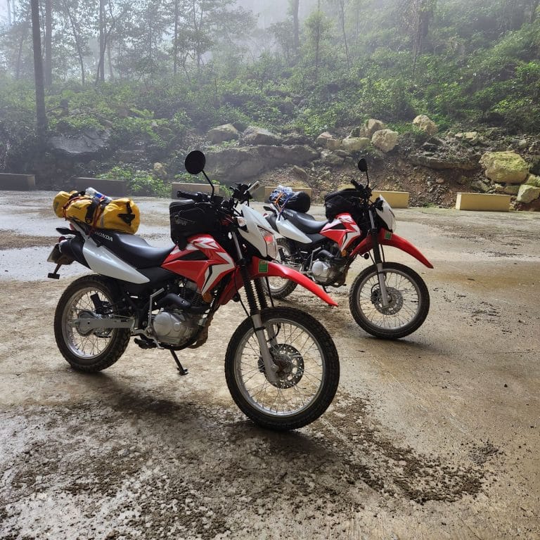 Our Honda XR150s in a cave in Cao Bang