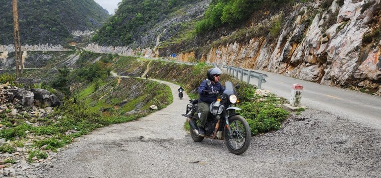 Royal Enfield riders join the main road after some great off road trails on their tour in Vietnam
