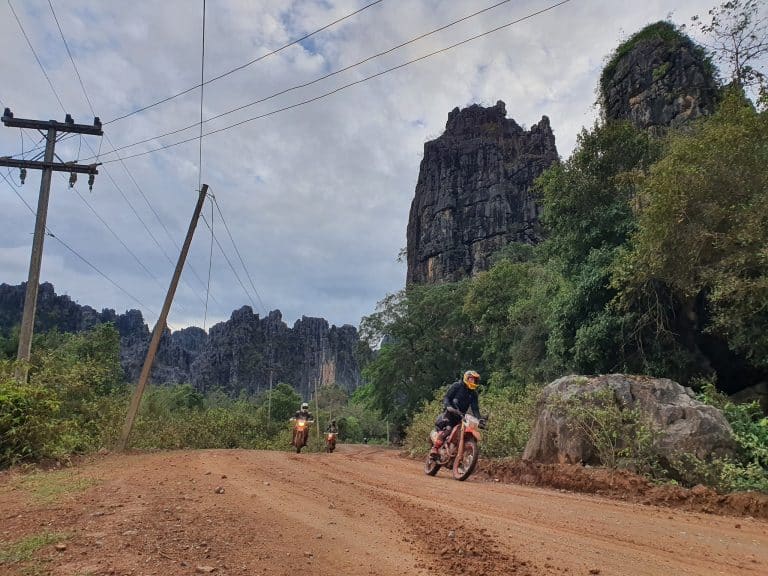awesome dirt track on a Laos motorcycle tour