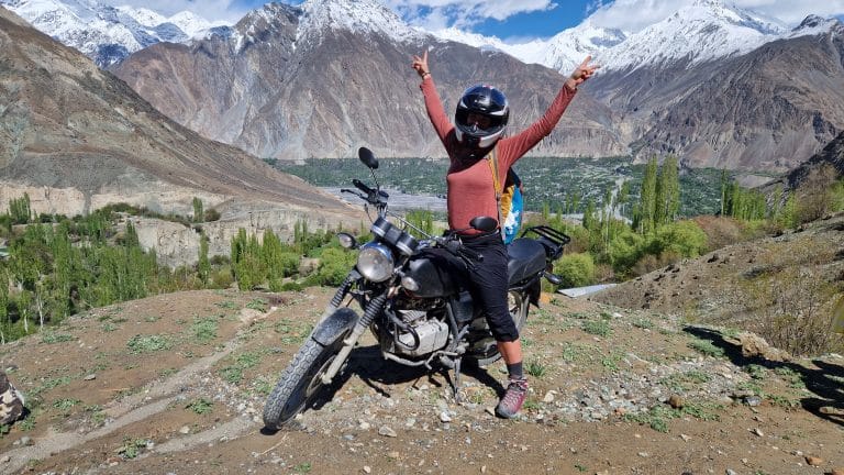 ADV Outrider poses for a photo in front of beautiful Pakistan mountain range