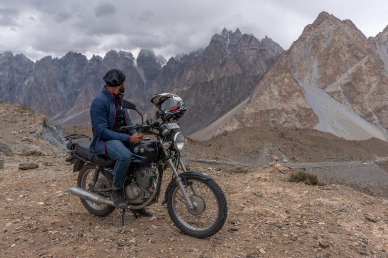 ADV Outriders rider looking out over the mountains of Pakistan